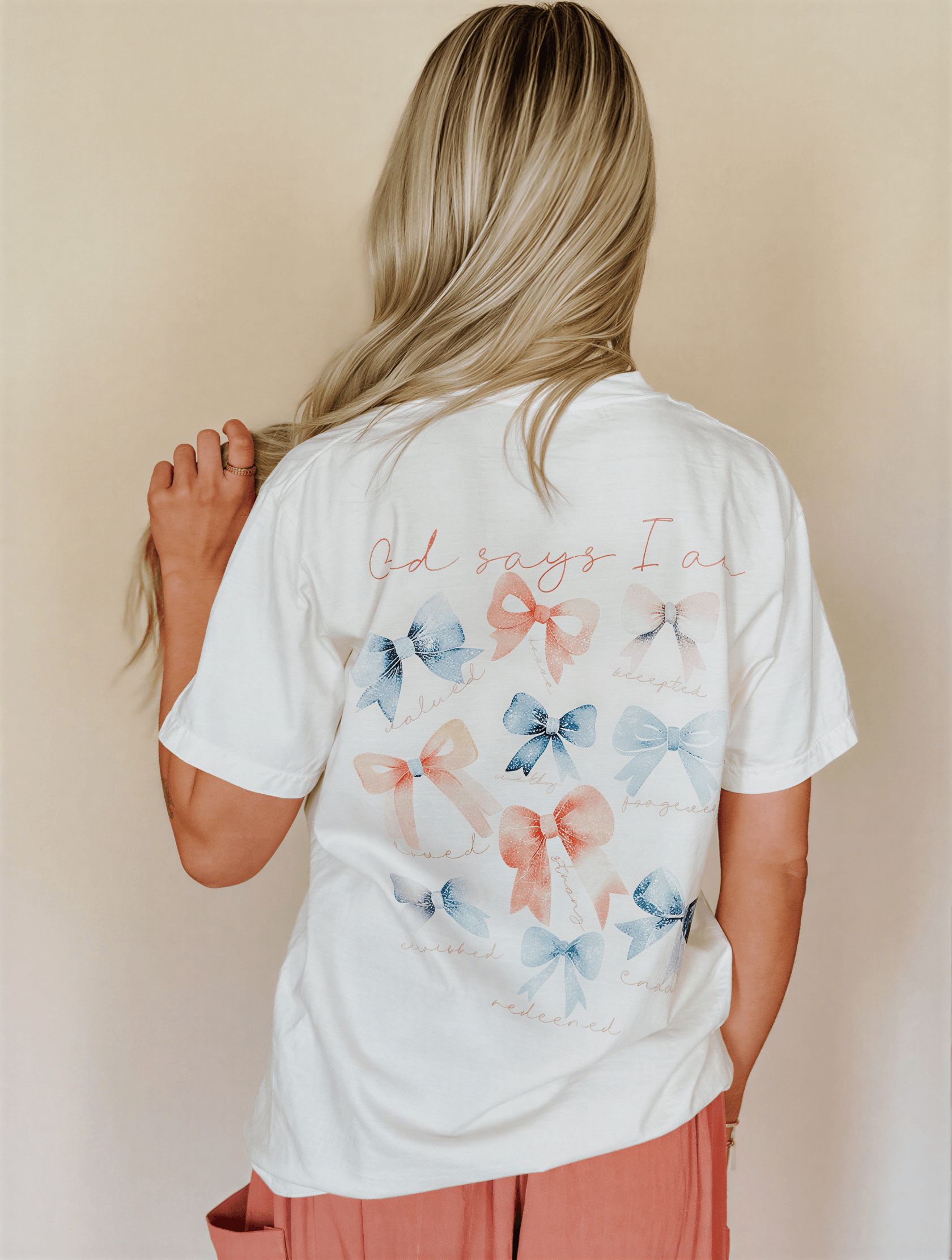 back of model wearing god say I am tee