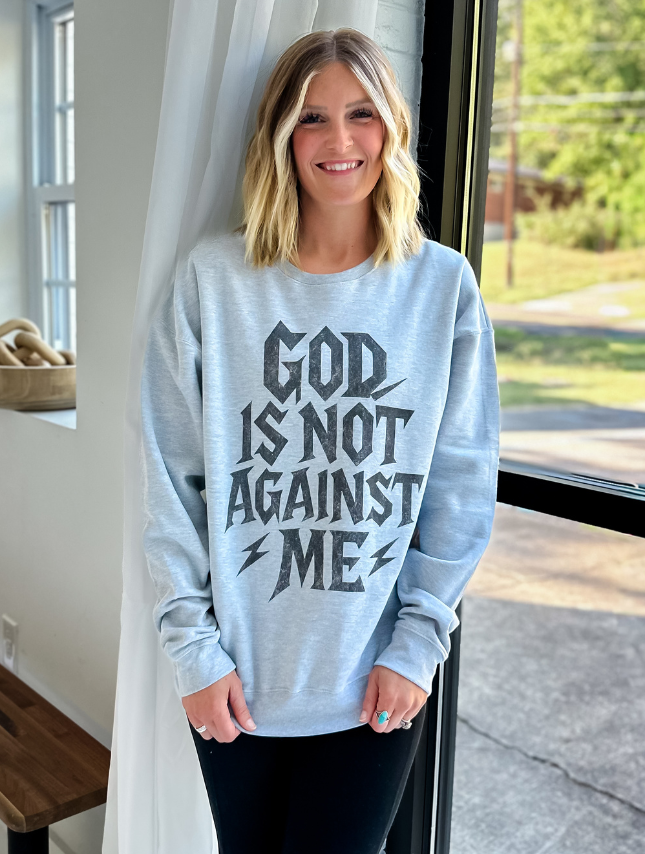 model wearing Not Against Me Sweatshirt