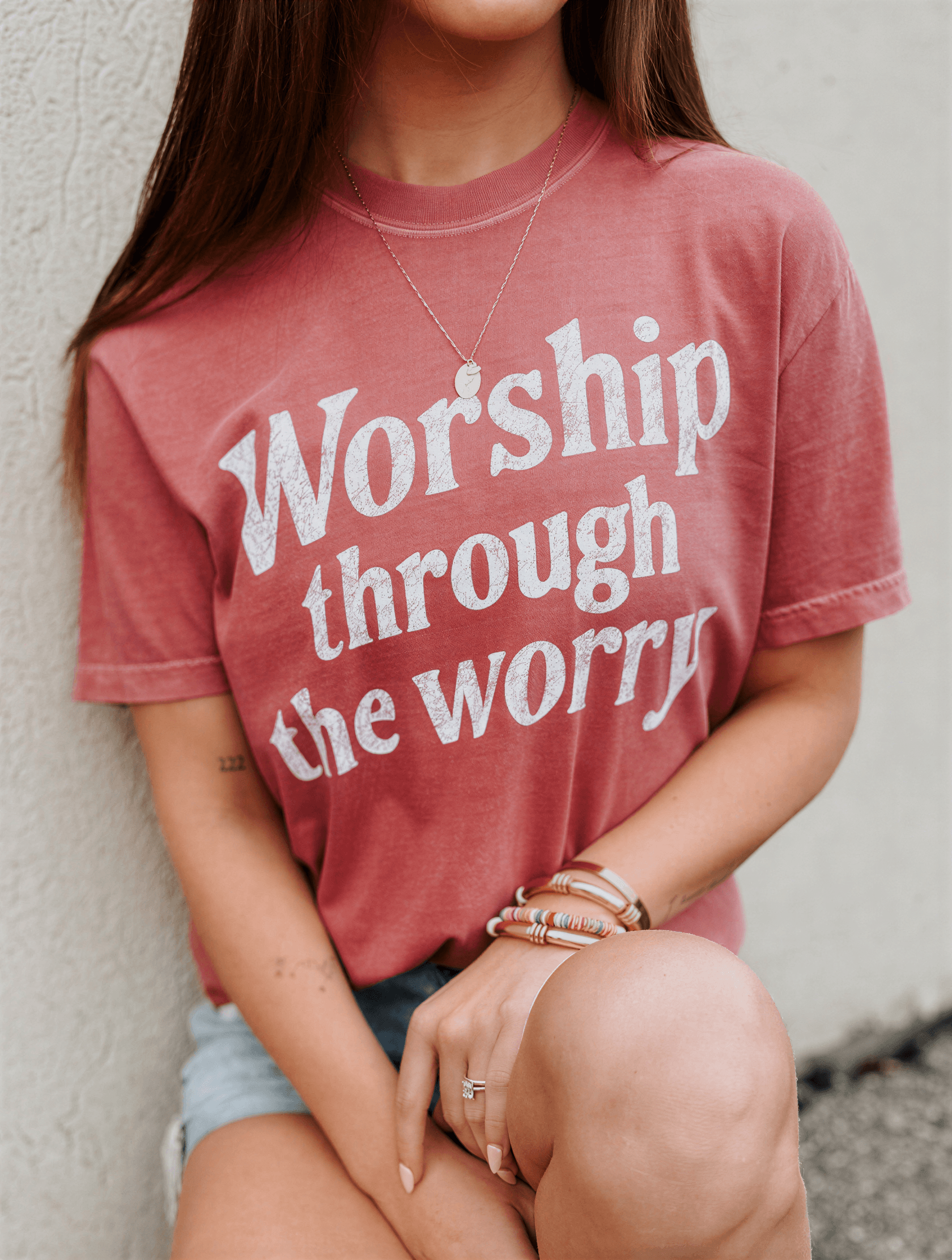 model wearing Worship Through Worry Tee