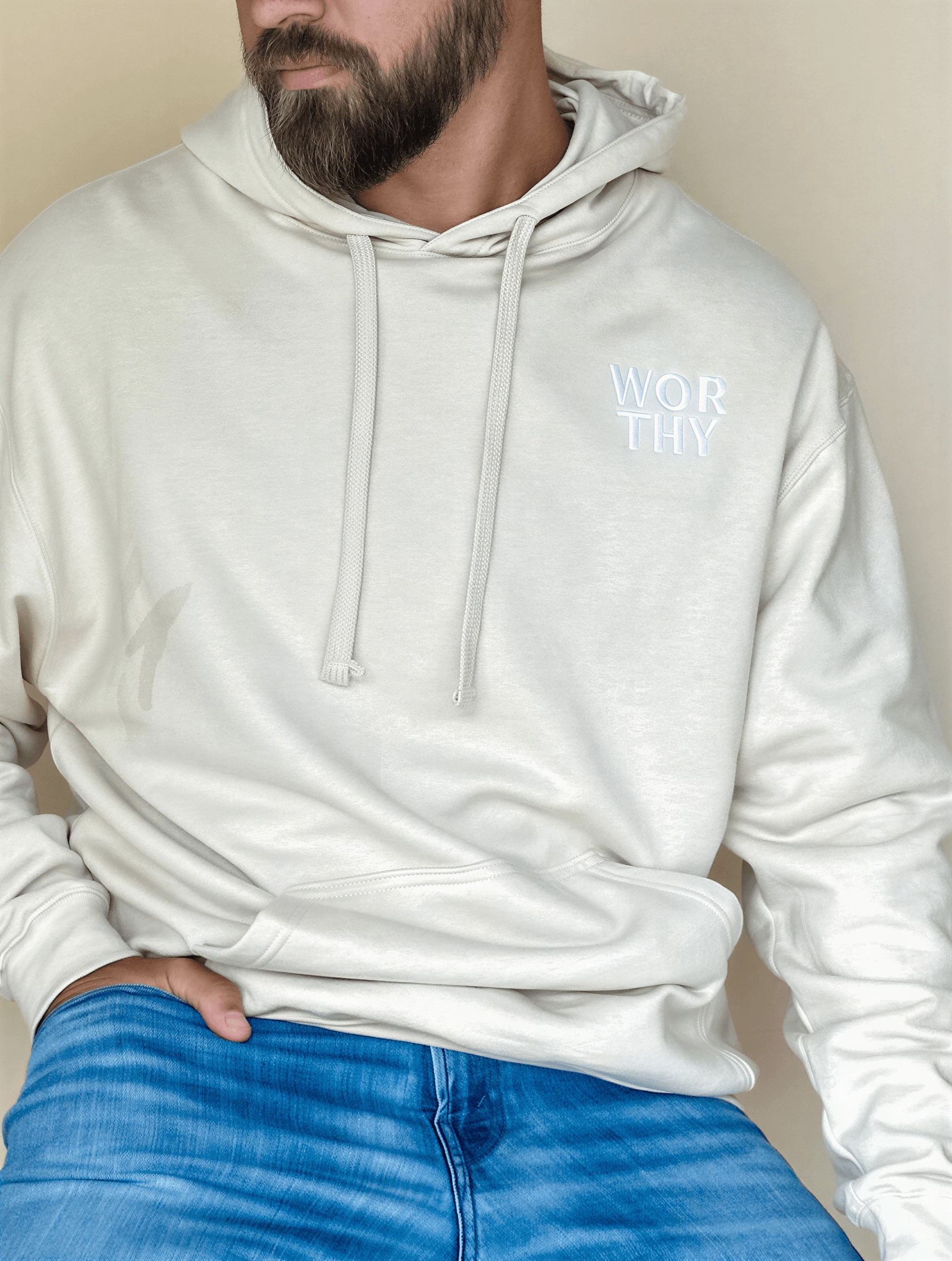 model wearing Worthy Embroidered Hoodie - Dust