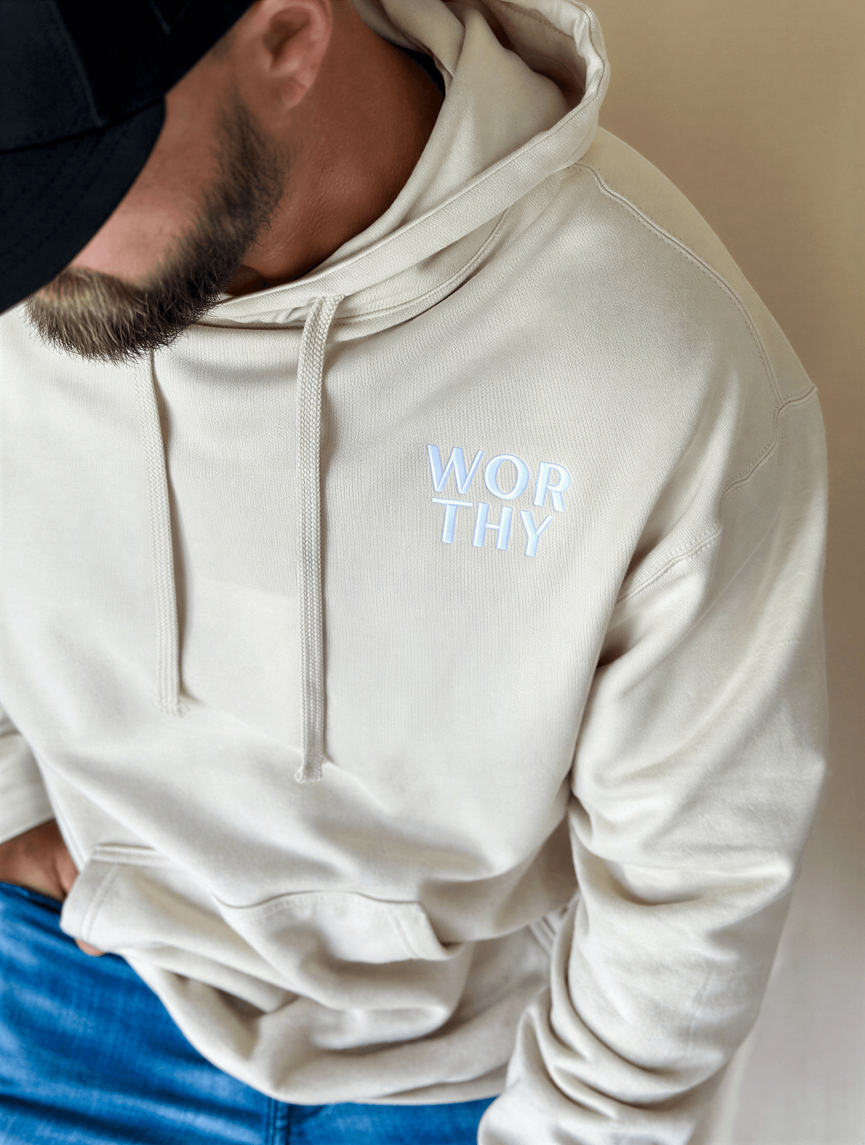 model wearing Worthy Embroidered Hoodie - Dust