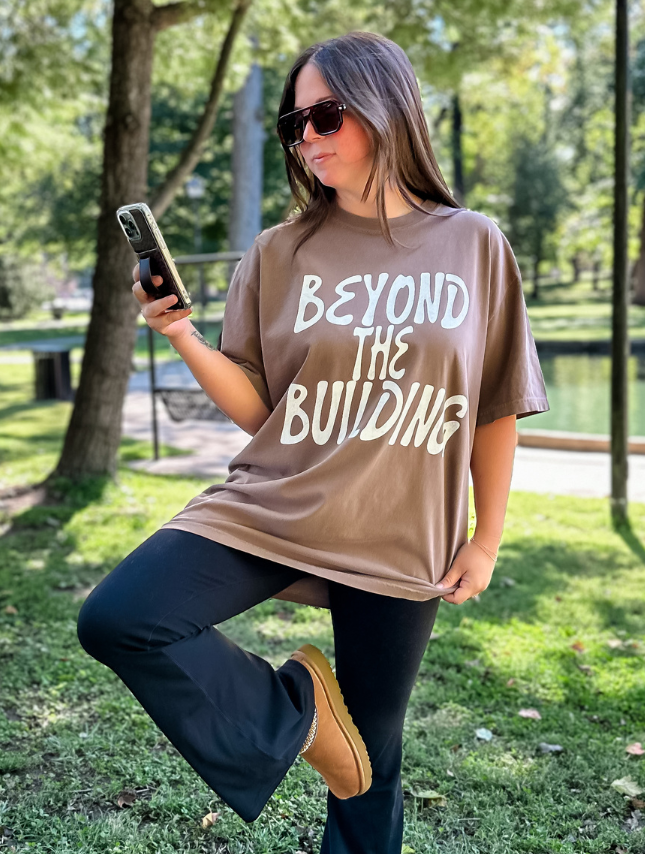 model wearing Beyond The Building Tee