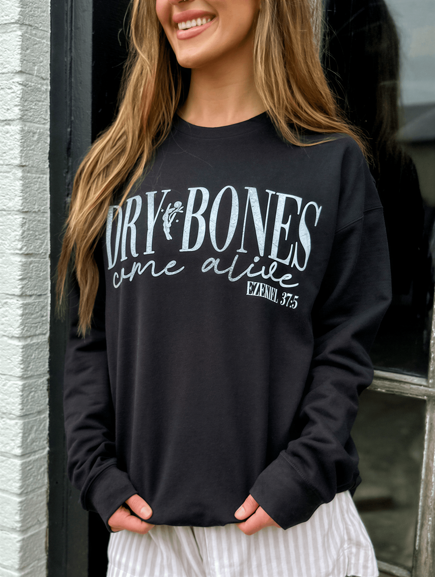 model wearing Dry Bones Come Alive Sweatshirt