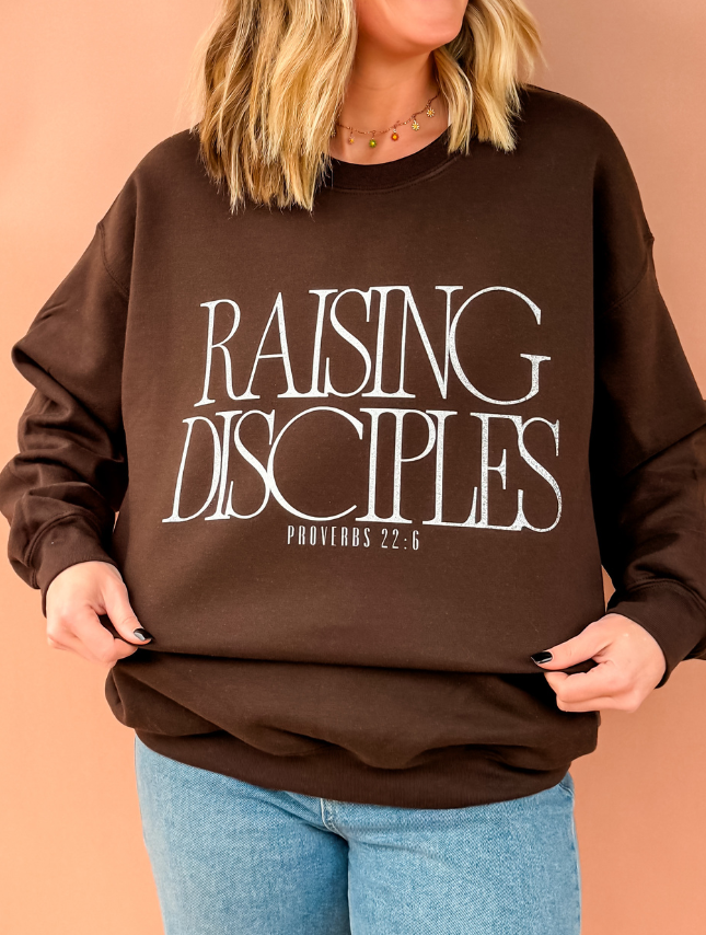 model wearing Raising Disciples Sweatshirt