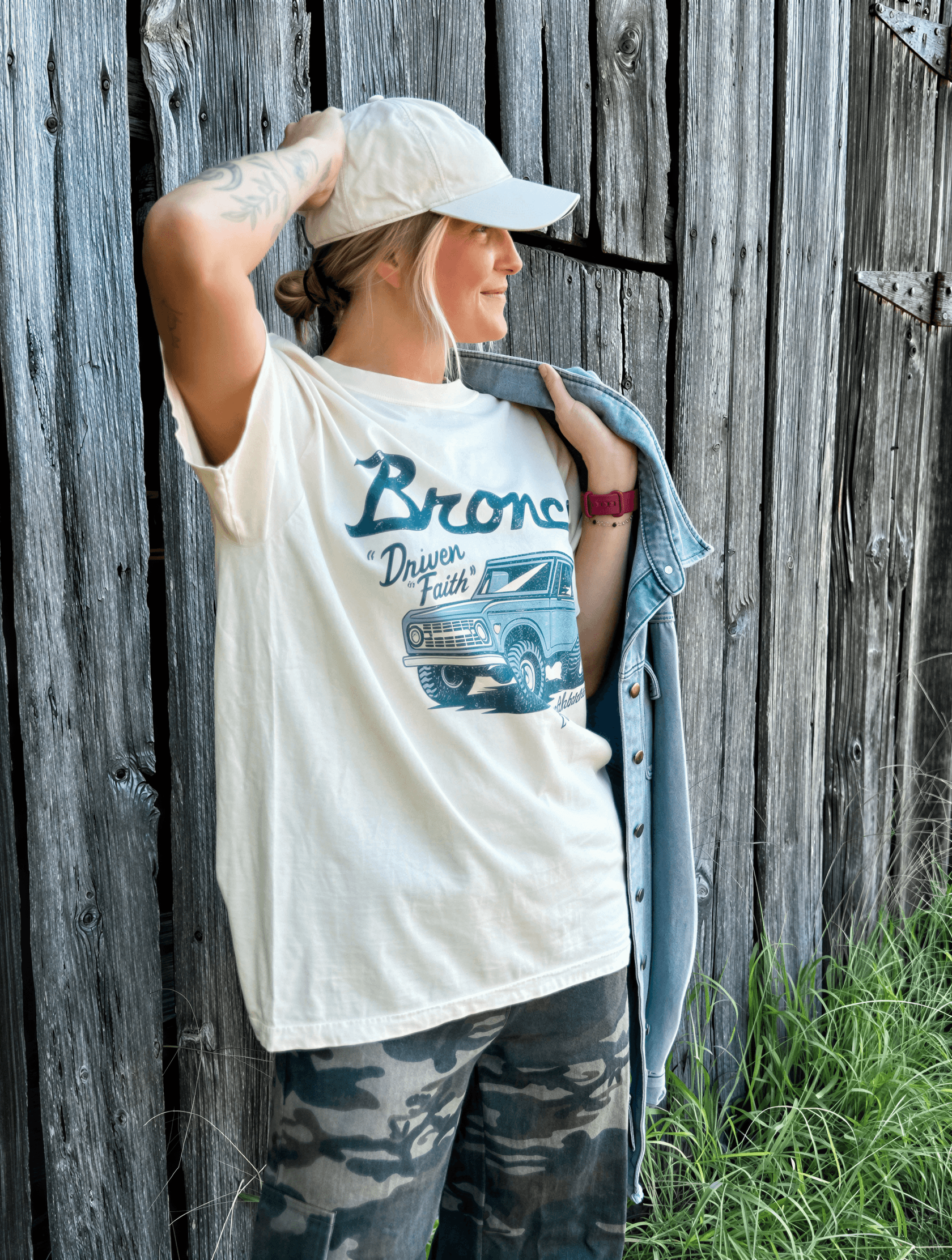 model wearing Driven By Faith Bronco Tee