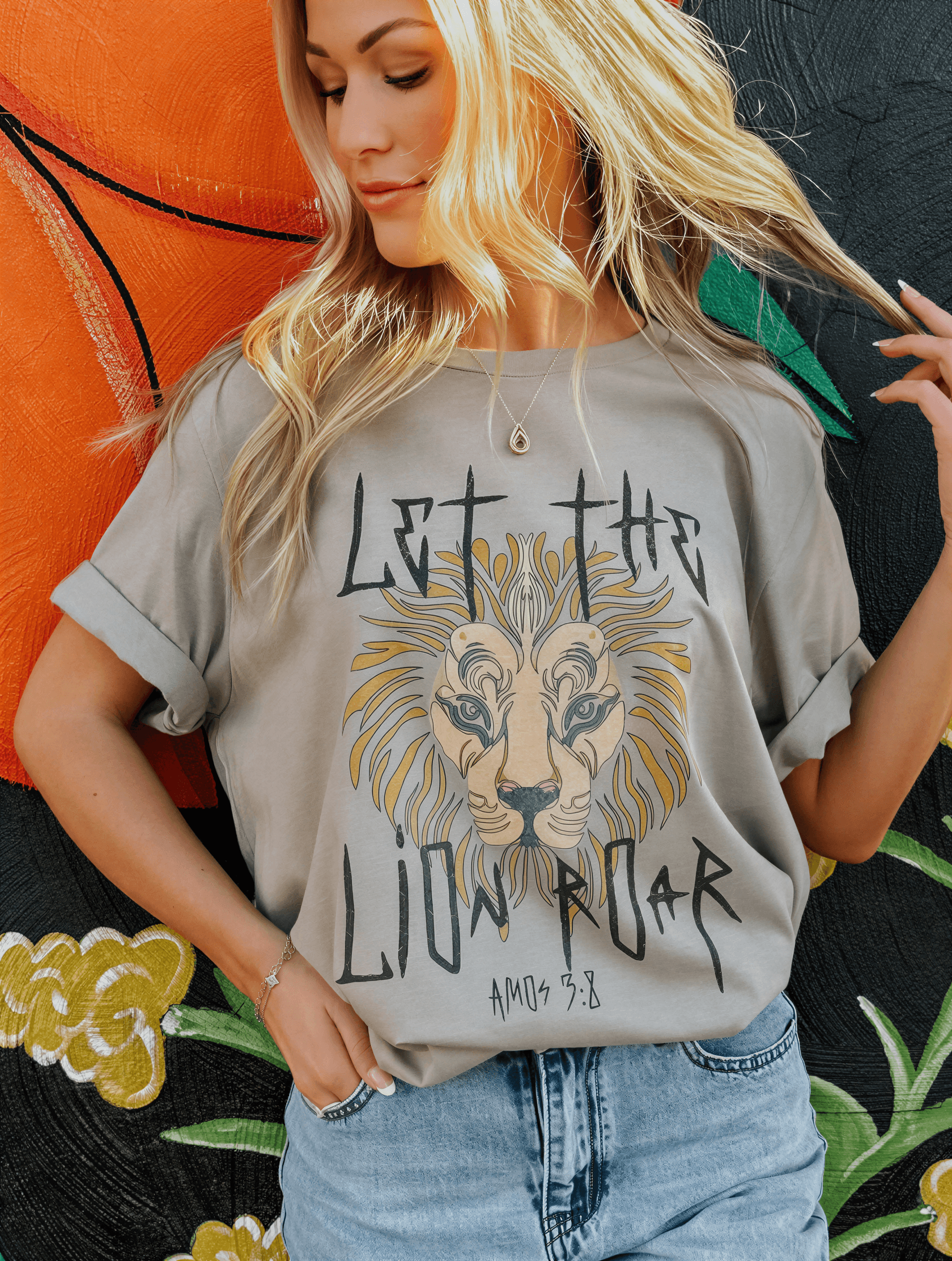 model showing up close of let the lion roar tee