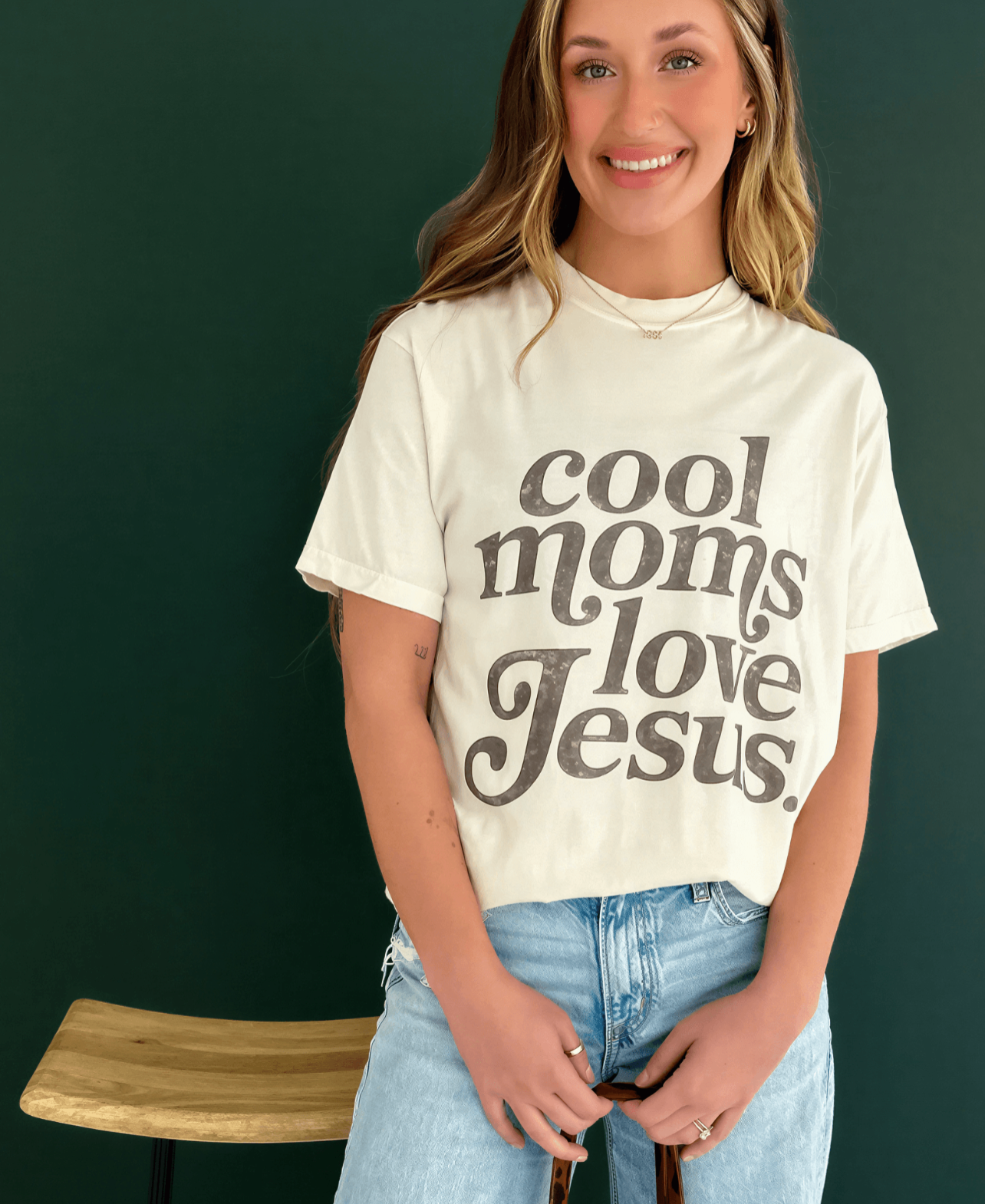 model wearing cool moms love jesus tee