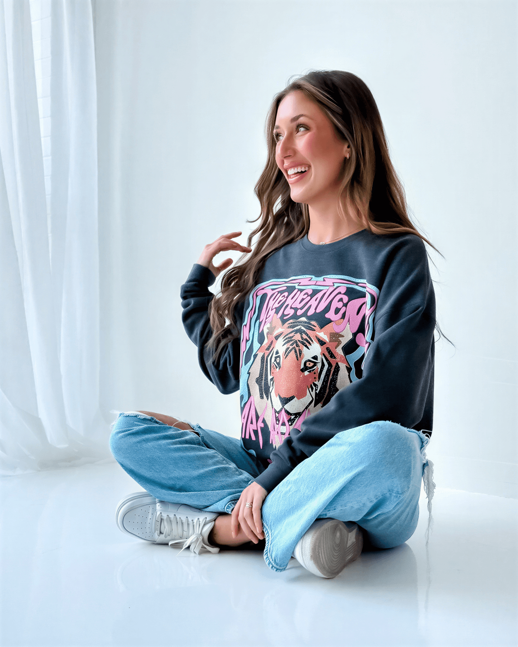 model wearing heavens are roaring tee