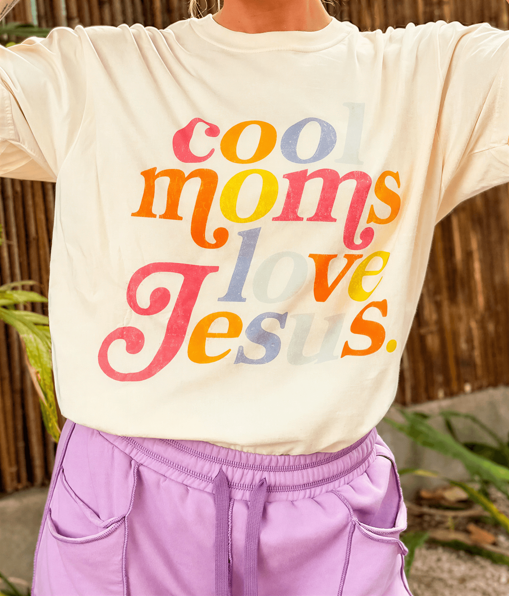 model wearing Colorful Cool Moms Love Jesus Tee