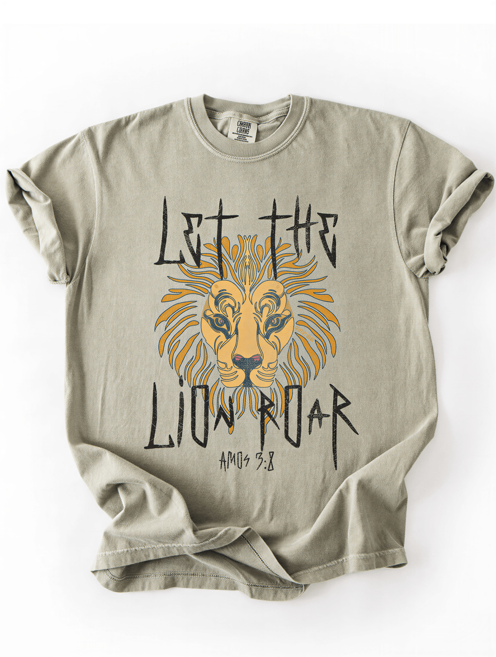 flat lay of let the lion roar tee