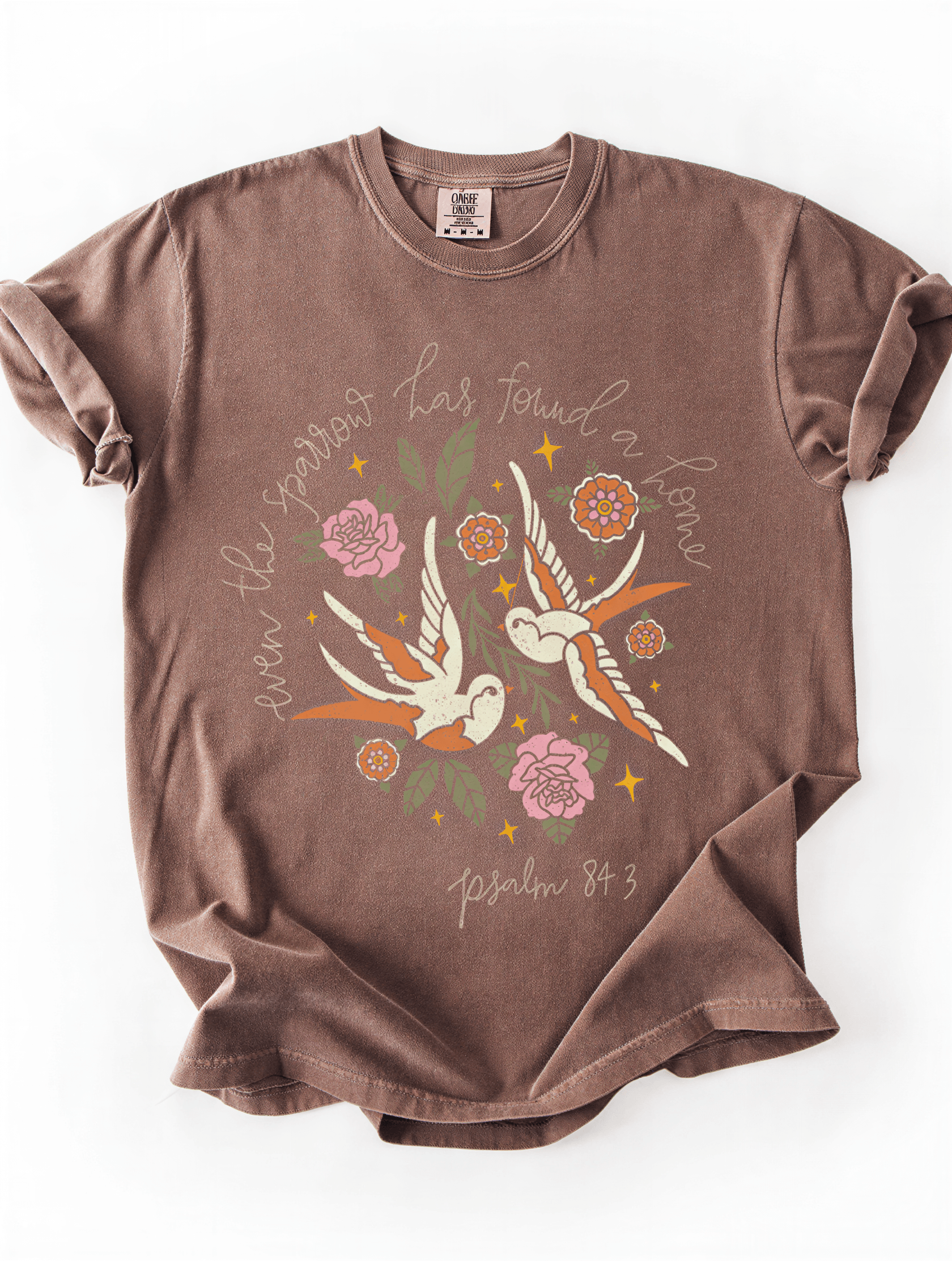 flat lay of Even The Sparrow Tee