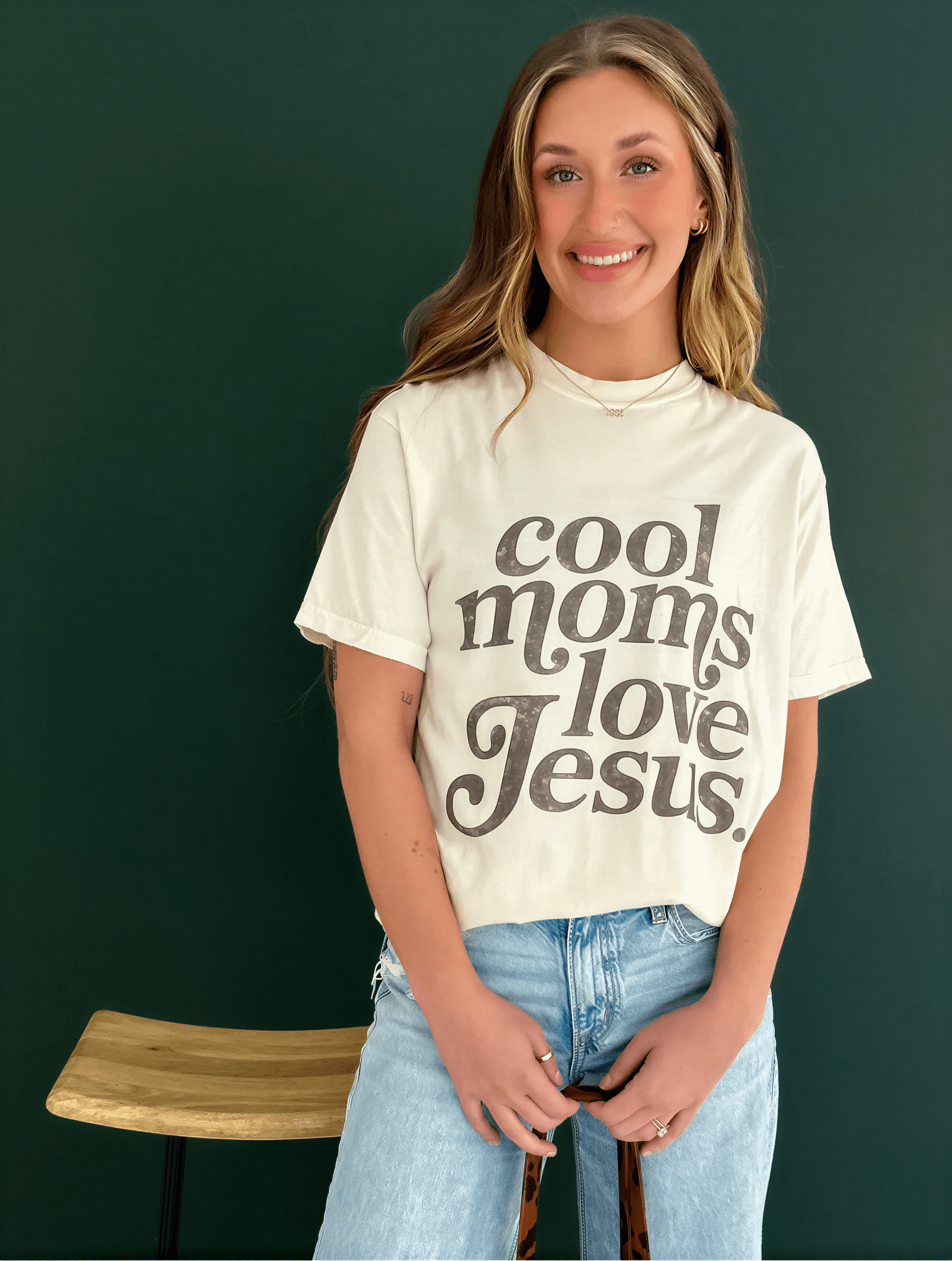 model wearing Cool Moms Love Jesus Tee