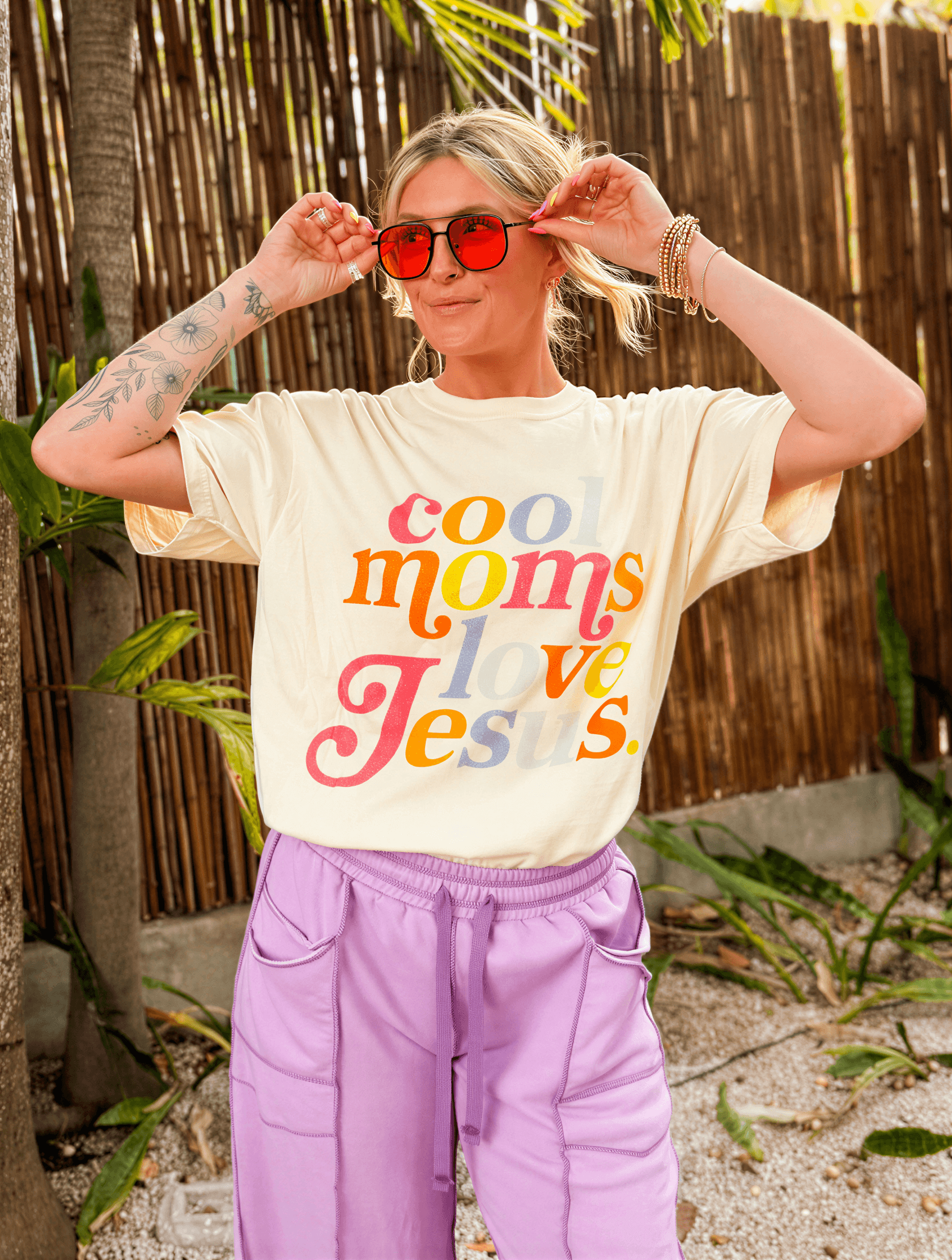 model wearing Colorful Cool Moms Love Jesus Tee