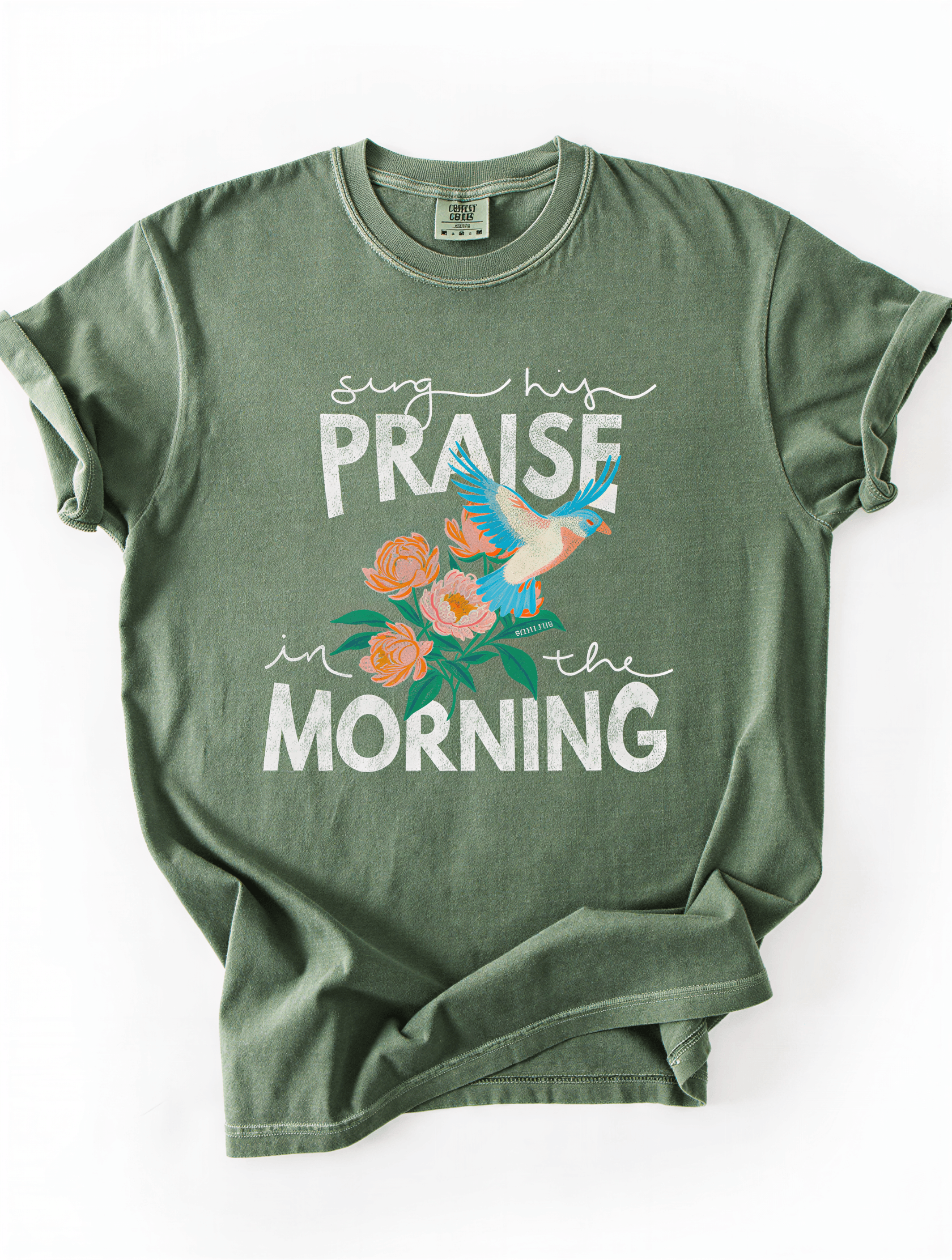 flat lay of model wearing Sing His Praise Tee