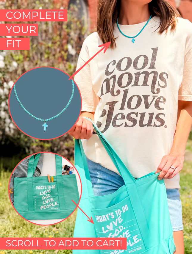 Cool moms love Jesus tee in cream with bold black text, worn by a woman with a turquoise necklace and tote bag.