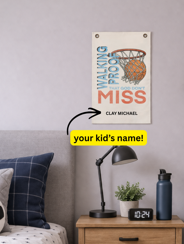Personalized tapestry featuring a basketball hoop and the text "Walking proof that God don't miss" with a name placeholder.