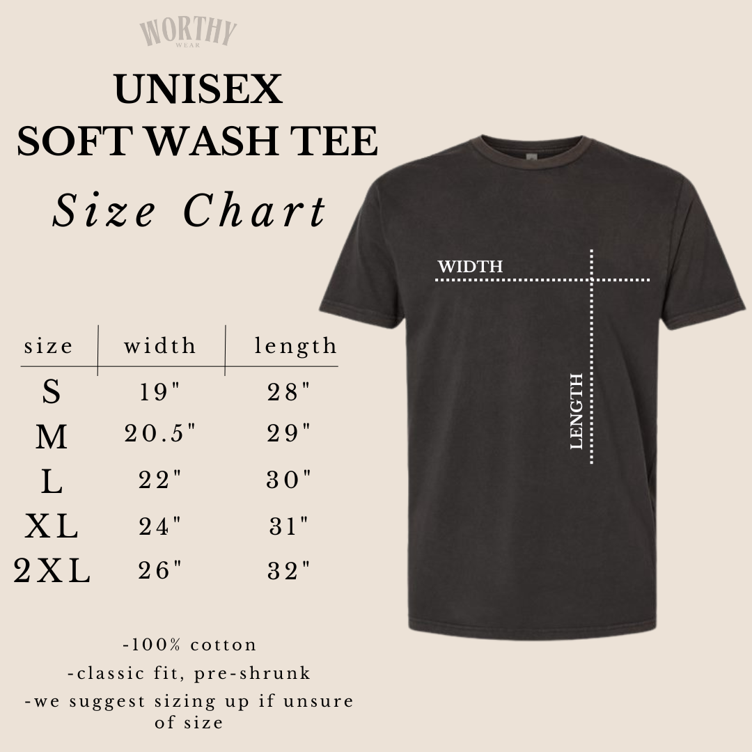 Unisex soft wash tee size chart with a black t-shirt on a beige background