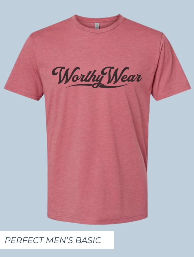 Worthy Wear basic tee in heather red with black logo, displayed on a light blue background.