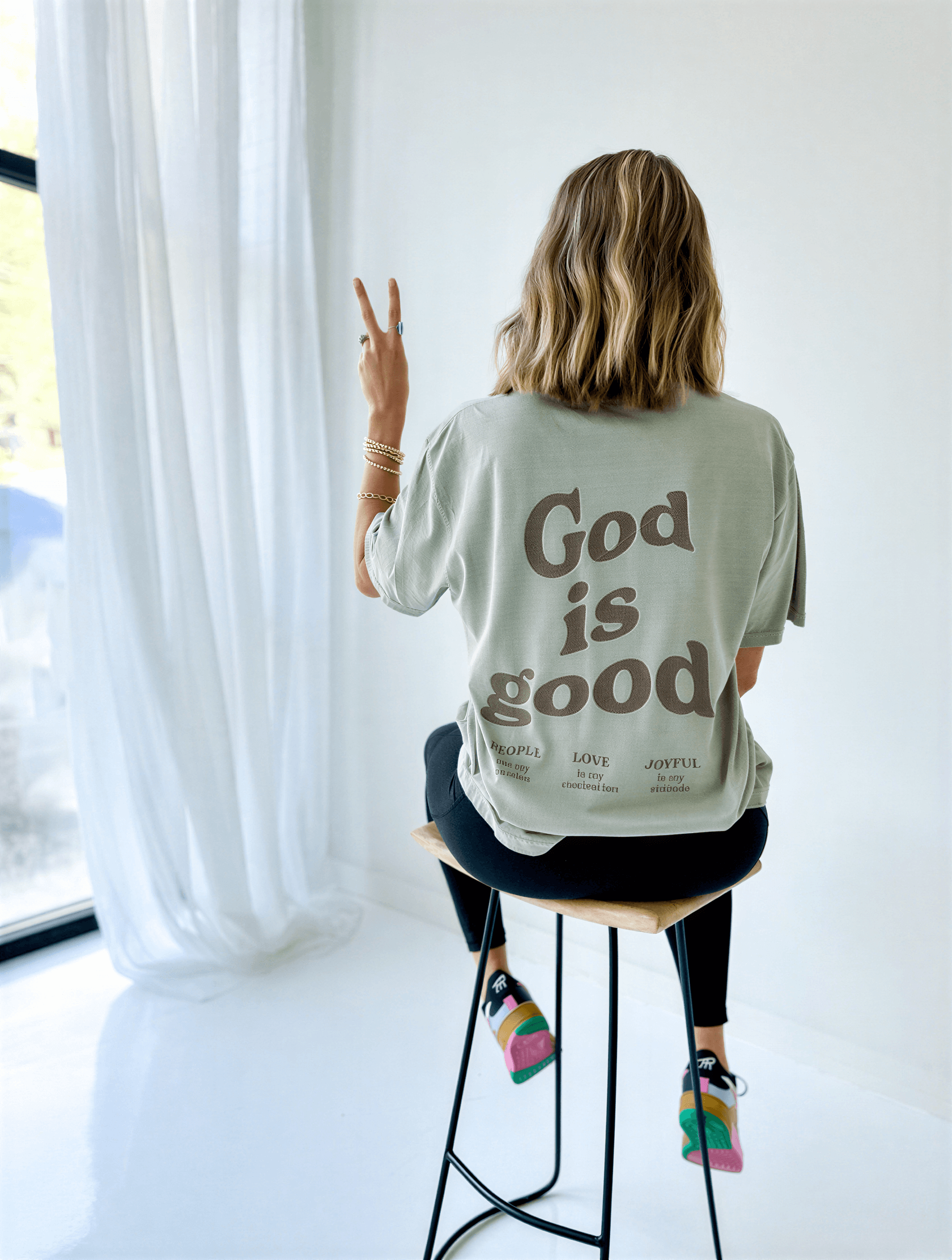model wearing God Is Good Tee