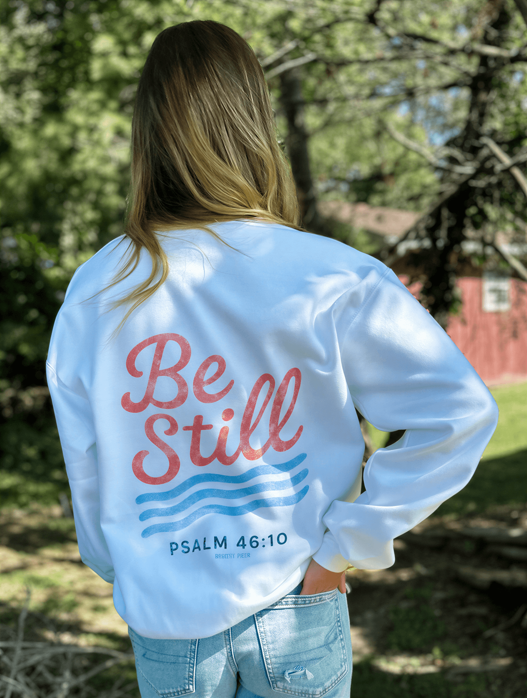 model wearing Be Still Sweatshirt