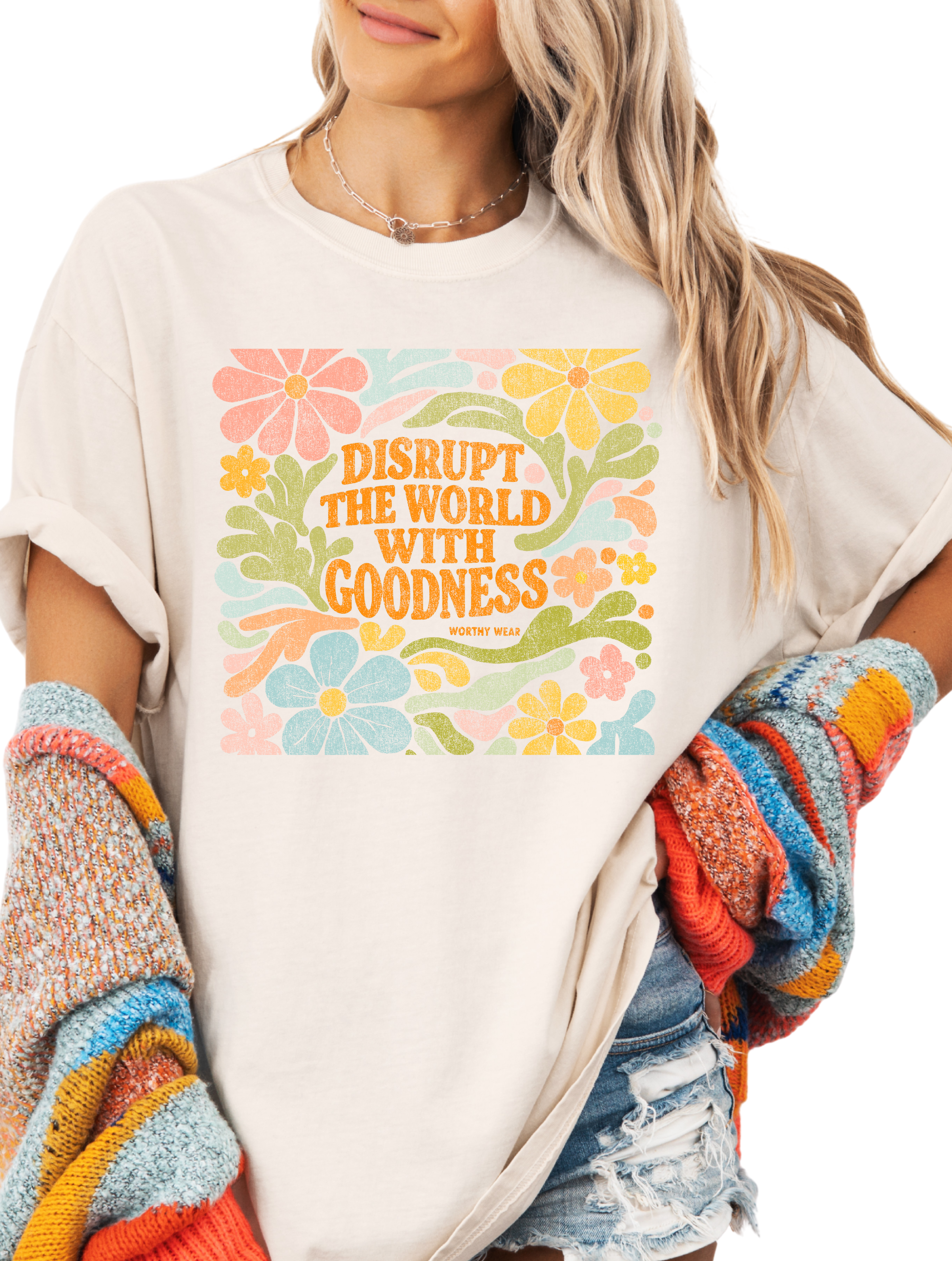 model wearing Disrupt With Goodness Tee