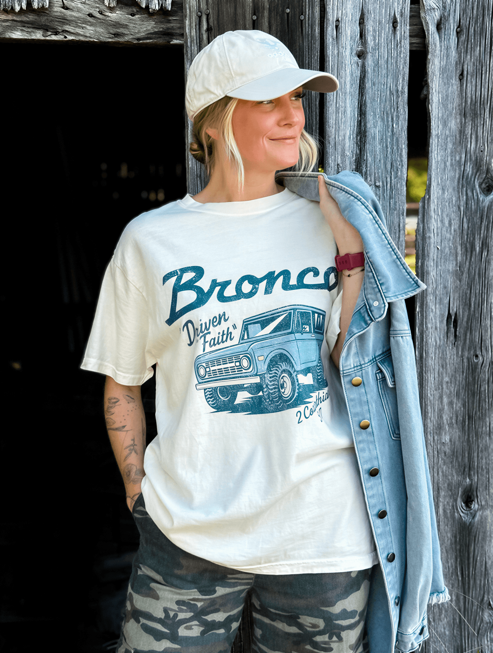 model wearing Driven By Faith Bronco Tee