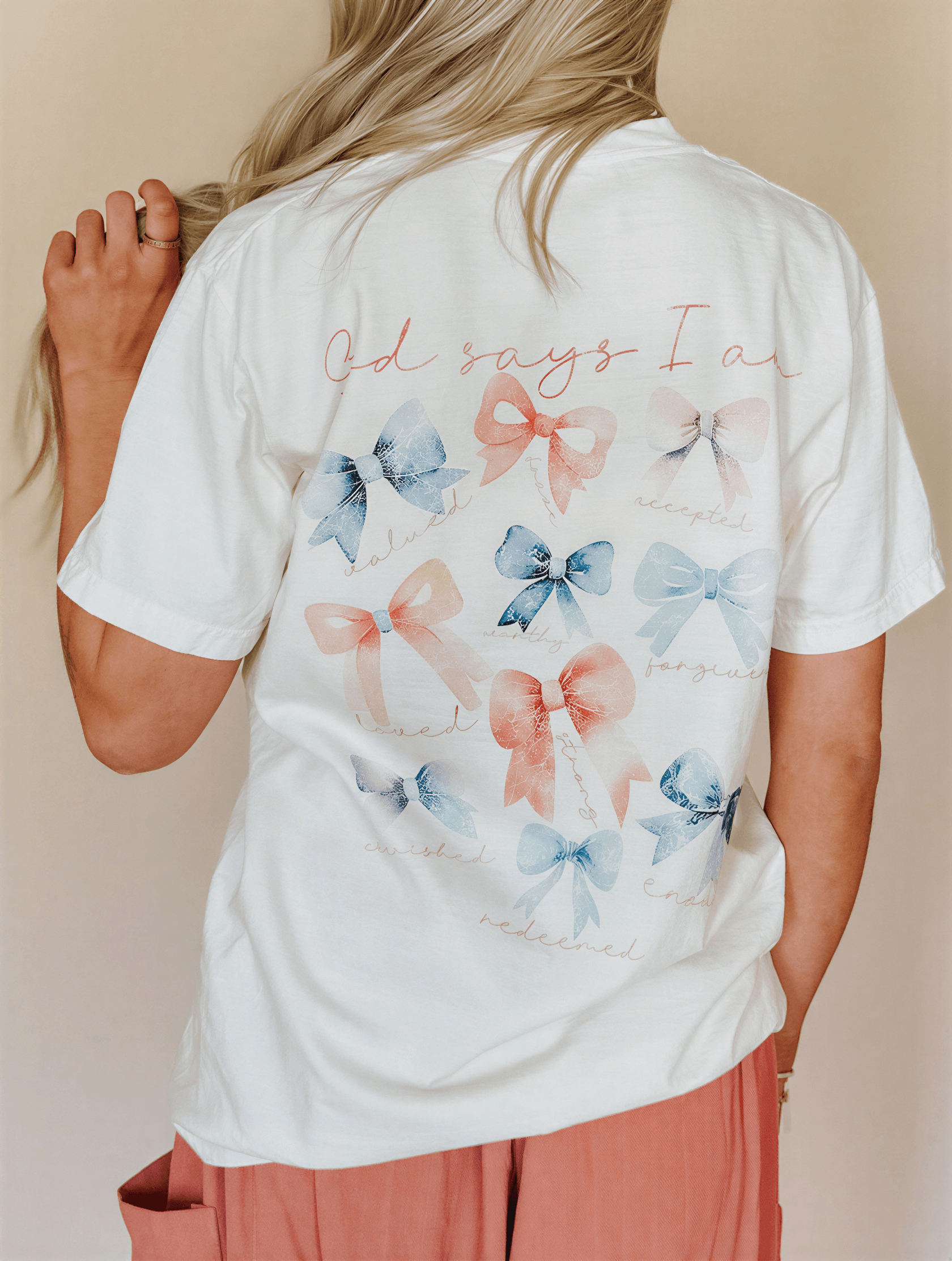 back of model wearing god say I am tee