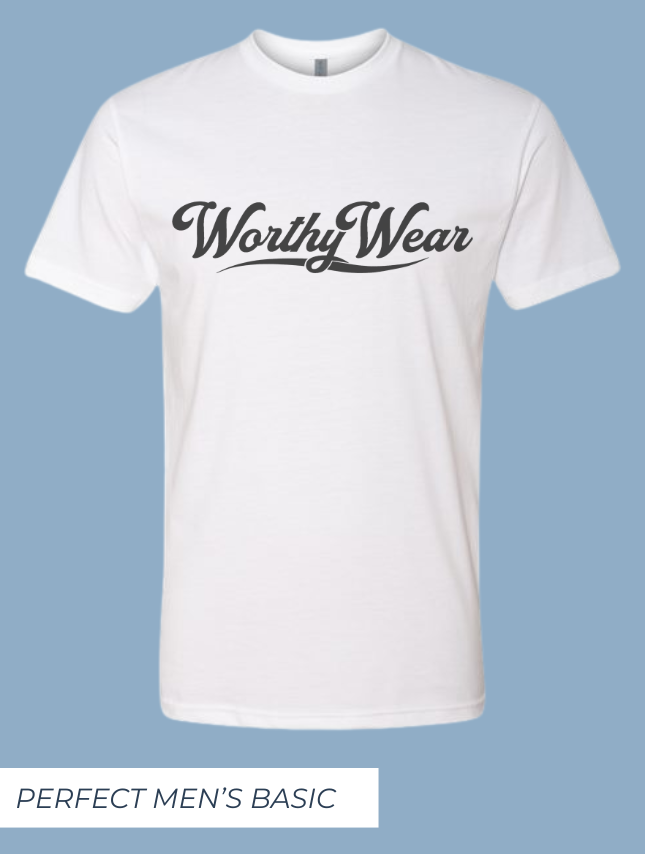 Worthy Wear basic white tee with black logo on a light blue background.