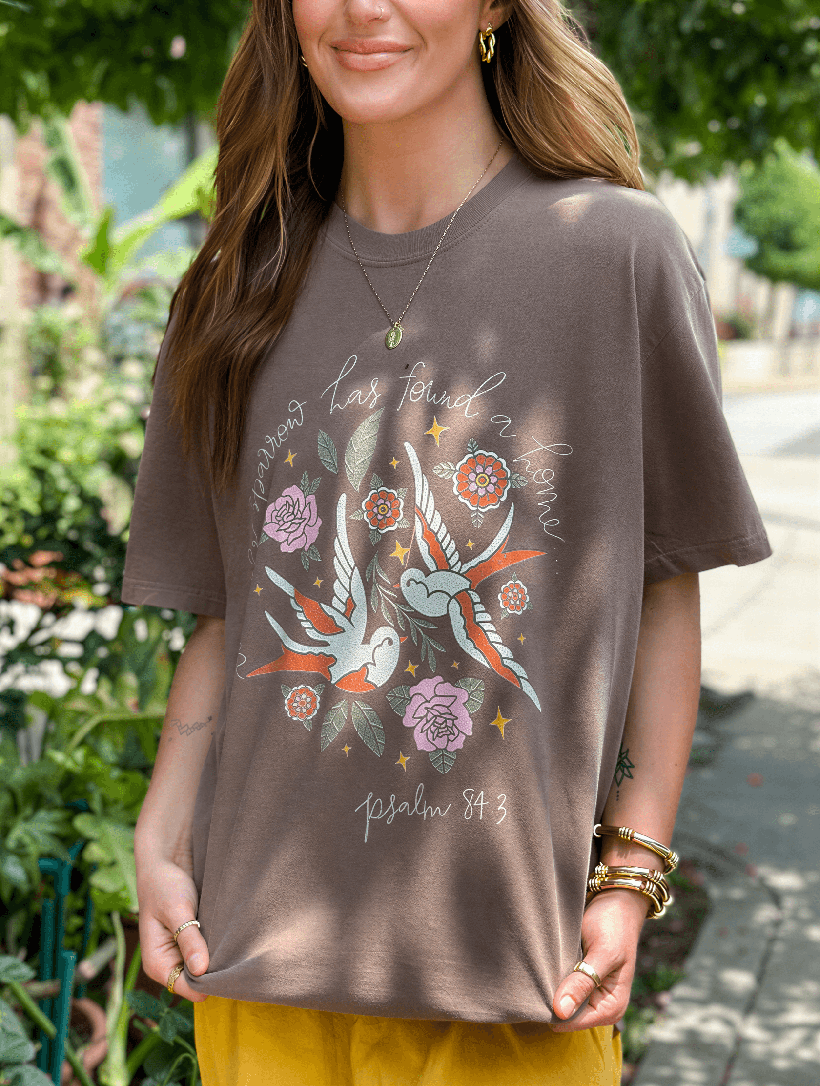 model wearing Even The Sparrow Tee