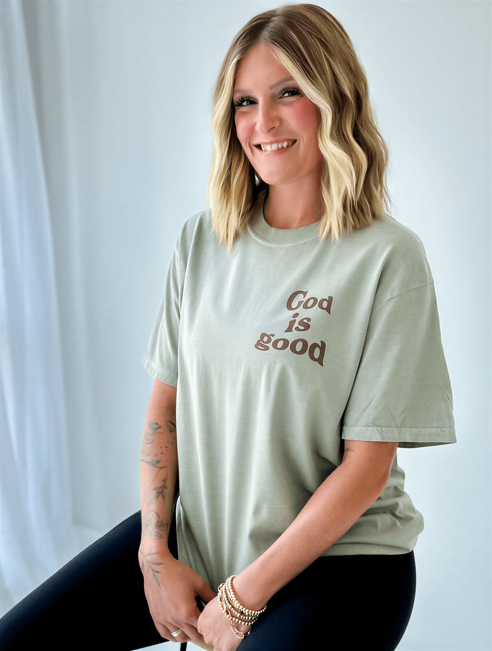 model wearing God Is Good Tee