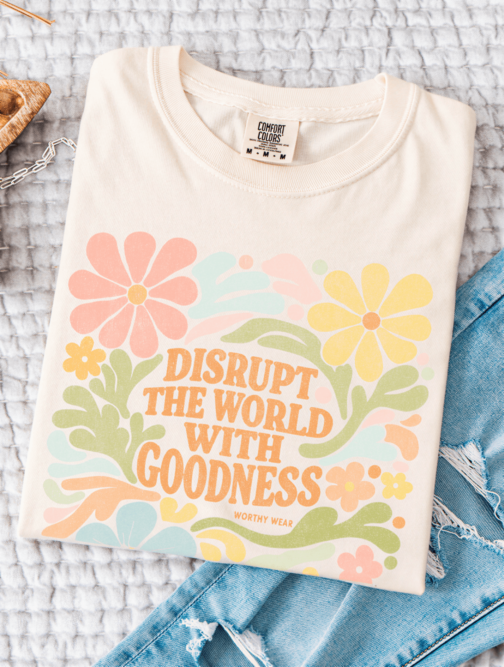 flat lay of Disrupt With Goodness Tee