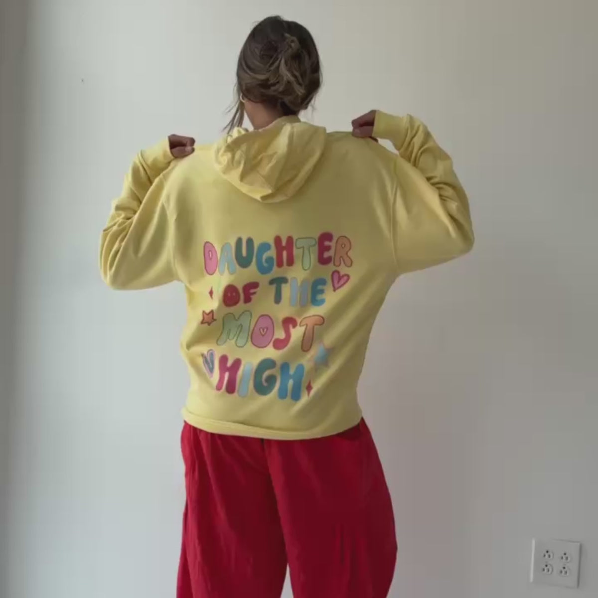 woman wearing daughter of the most high