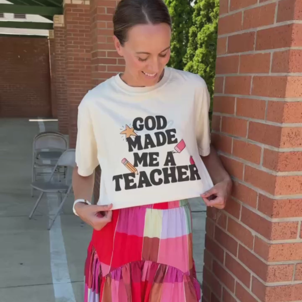 woman wearing god made me a teacher