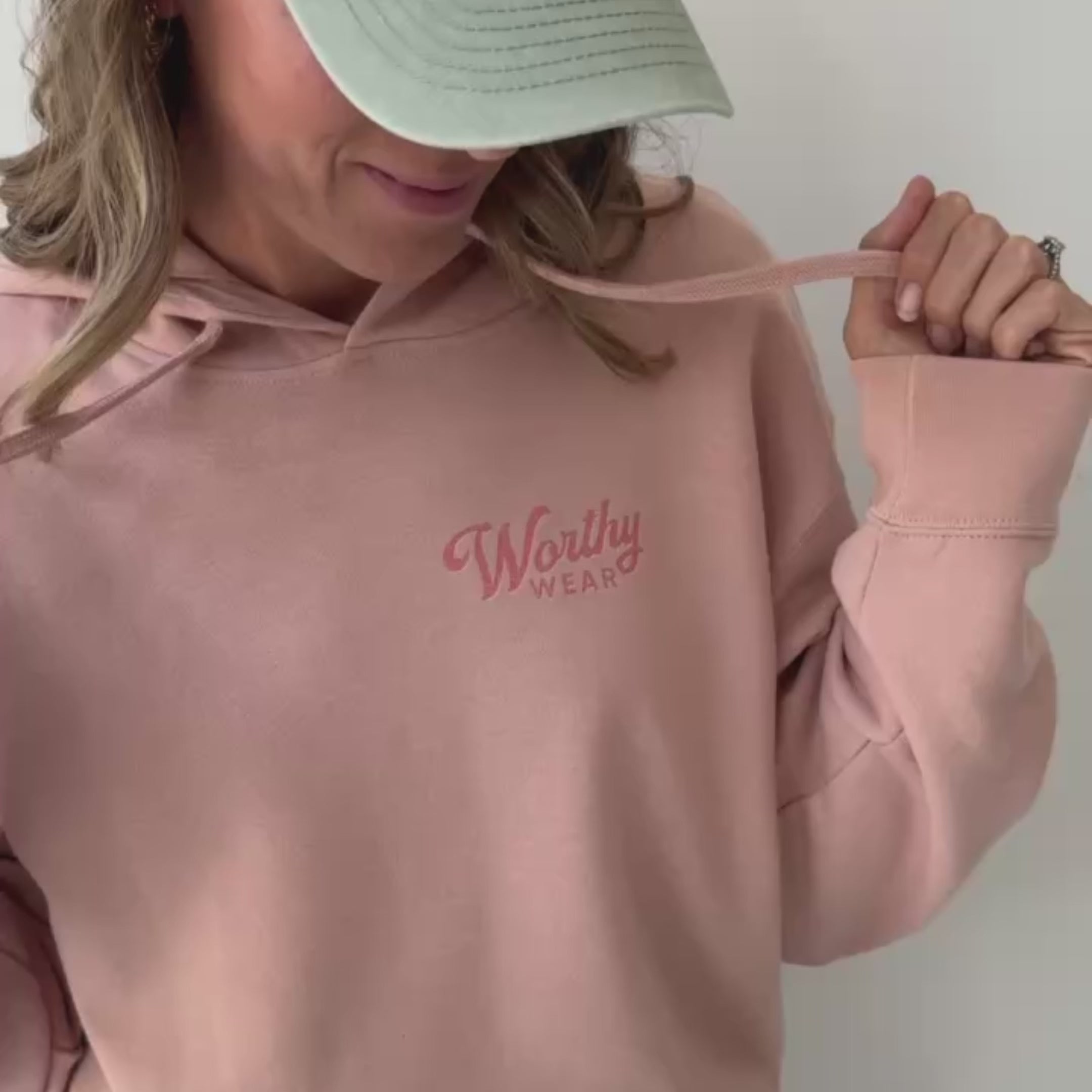 woman wearing motherhood is holy work